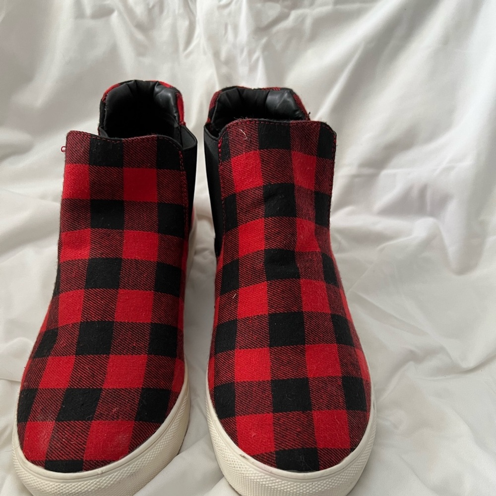 Women’s Buffalo plaid ankle slide on booties.